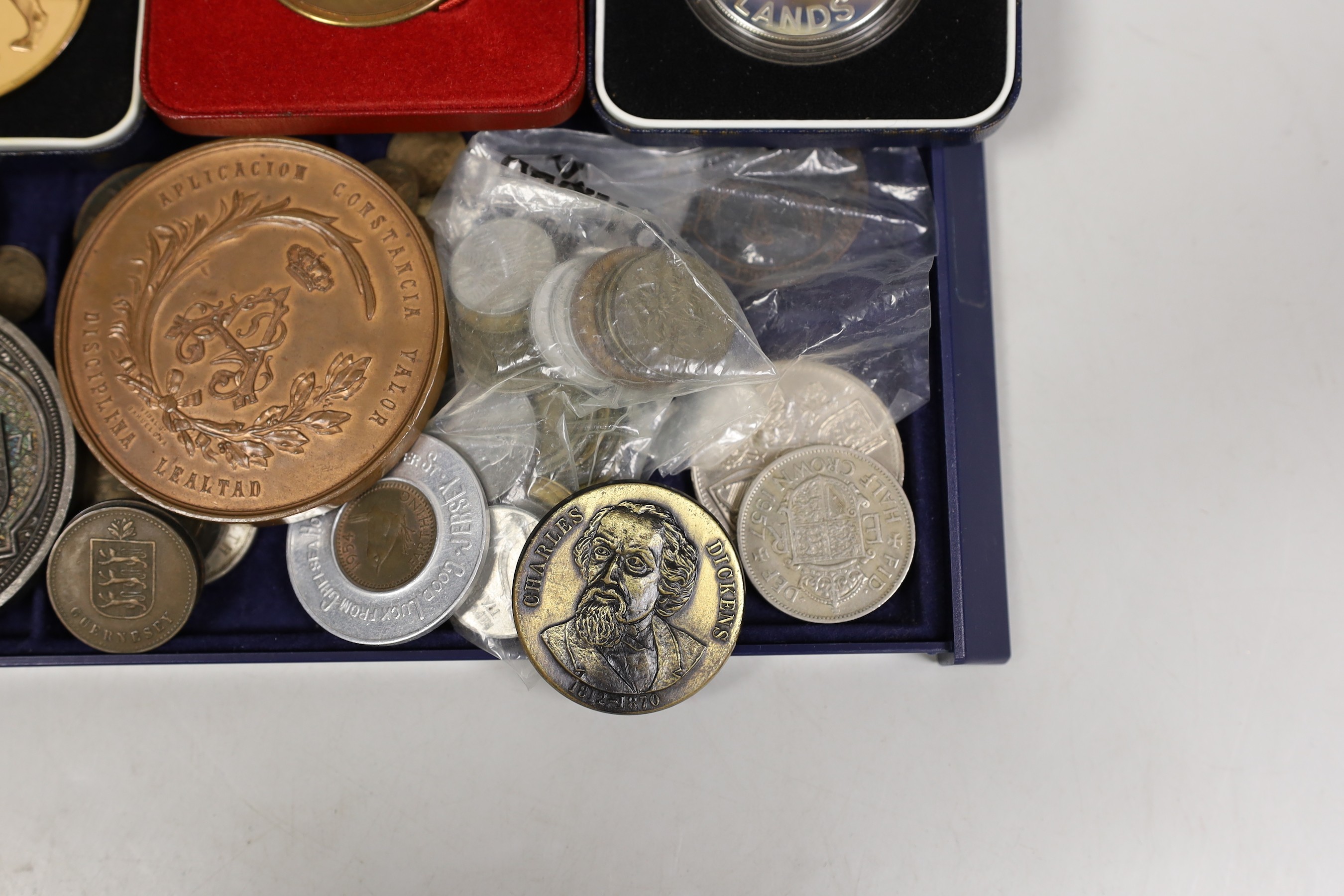 A Princess Louise marriage medal, a Barcelona 1878 valor bronze medal, two Falklands medals (one silver) and a Tower of London medal, and other various coins and medals
